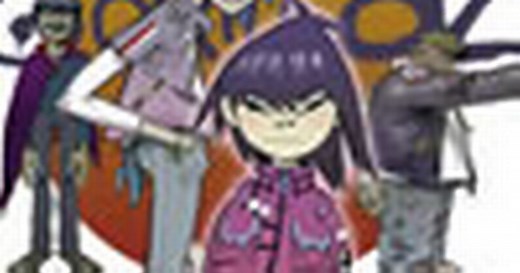 Animated group Gorillaz show their real faces for the first time during live show