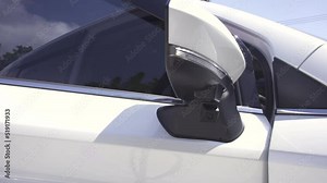Driver gets out of the car, closes the door and locking car uses keyless entry access by putting finger on handle with fingerprint. Keyless security concept.
