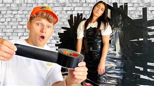 A boyfriend pulls an extreme duct tape prank on his girl