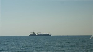 Large container ship out in the ocean - Free Stock Video