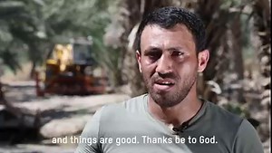 Ahmad manages a date plantation and takes care of a new solar water...