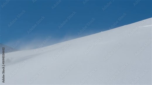 Snow loop with strong directional wind pushing flakes diagonally