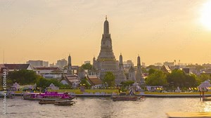 4K Time lapse of Wat Arun Temple at sunset. Wat Arun or known as Temple of dawn is a Buddhist temple located in Bangkok Yai district in Bangkok, Thailand