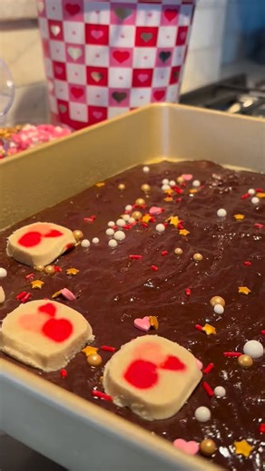 Angelique on Instagram: "Brownie mix + sprinkles + sugar cookies = a crowd favorite!❤️ Prep brownie mix, add sprinkles, place cookie dough on top. Follow directions for the brownie mix and possibly add minutes, give or take. Pro tip: once cool, place in the refrigerator for 30 minutes for clean cuts! #bakinghack #easybrownies #diymom"