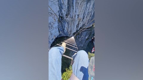 China unveils 5,000ft high climbing ladder over looking cliffs