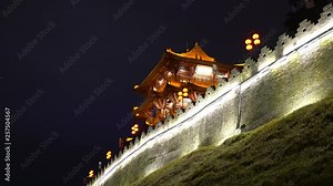 Night view of the Zhaoqing Ancient City Wall with Pi Yun Lou building