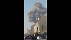 Smoke rises from Tehran's Azadi Stadium after strike