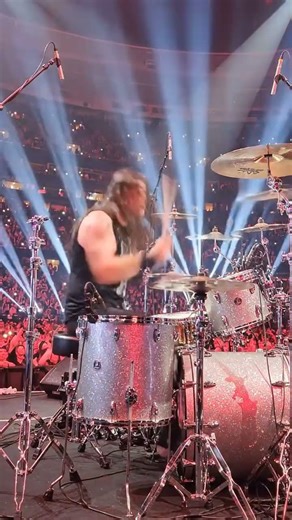 a guy drumming in a stadium #AI