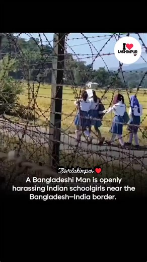 I LOVE LAKHIMPUR on Instagram: "Disturbing footage has surfaced from the Indo-Bangladesh border (West Bengal/Tripura sector). In the video, a Bangladeshi man on a motorcycle is seen openly stalking and harassing a group of Indian schoolgirls walking along a rural border road. He circles them repeatedly, waves aggressively, and makes gestures while the visibly frightened girls look back in fear before he speeds away. The 20-second clip, captured in broad daylight near visible border fencing, has