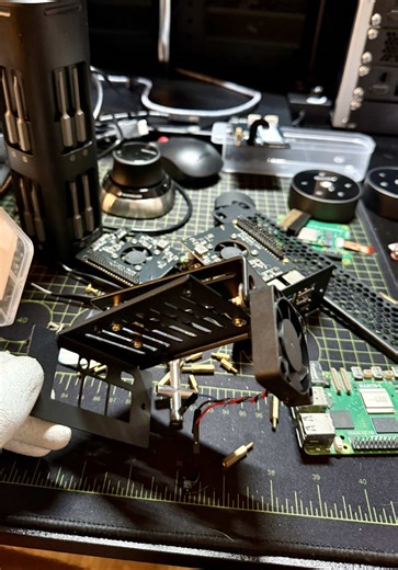 Every autonomous agent needs reliable infrastructure. Today we’re installing the exhaust fan on one of the Pi 5s using M2 standoffs for a solid, permanent mount. No zip ties or tape this fan is bolted down because these agents run 24/7 self-improvement loops and the cooling has to match. The standoffs keep everything secure and give just enough clearance for airflow to pull hot air through the Pi and push it out of the rack. One down, three to go. #fyp #openclaw #aiagents #techtok #raspberrypi5