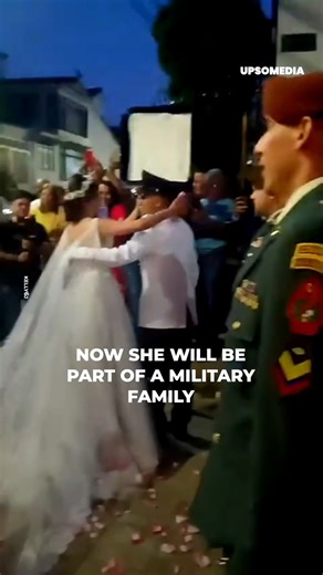 They were about to finish their wedding ceremony when a soldier with a saber did this to the bride. | Positive