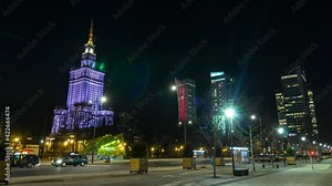 Warsaw night motion timelapse in city centre. View to the science palace at nigth, traffic lights, city life