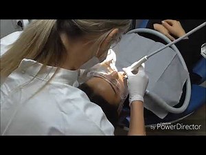 Dental hygienist visit female patient