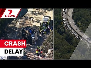 Truck crash on the M1 motorway causes delays | 7NEWS