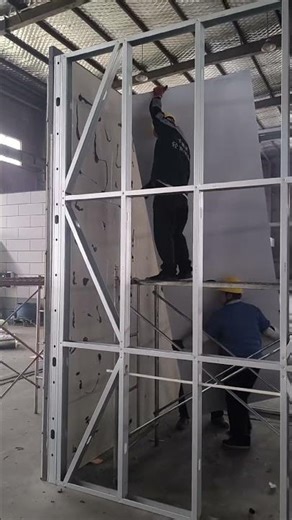 On-site assembly demonstration of the light steel structure frame.