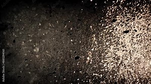 A dark background with a gritty texture, featuring frequent flickering and static. The surface is covered with numerous scratches and smudges, giving it a worn-out and neglected look.