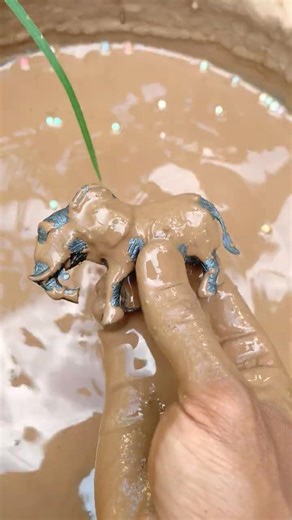 Cleaning a mini elephant ASMR Sastisfying mud ￼