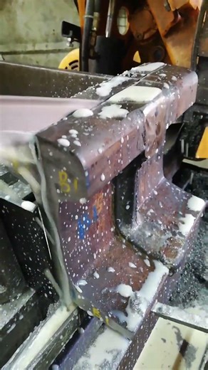 USING BAND SAW TO SPLIT RAILWAY PIECE PRIOR REPLICA INVESTIGATION IN METALLURGICAL LABORATORY