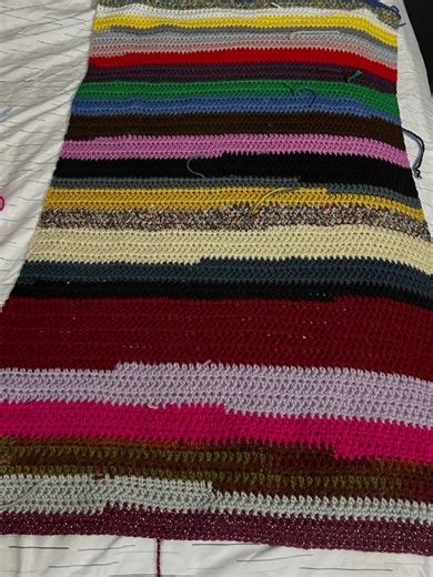 Finished the back panel of my scrap cardigan. #crochetcardigan #cardigan #crochetsweater #workinprogresss #scrapyarnproject