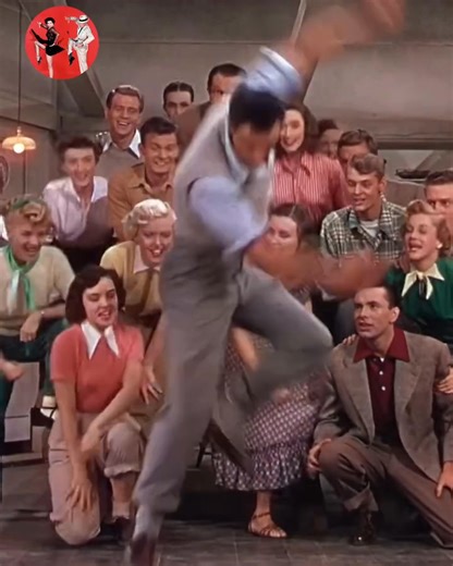Get @reshare_app • @classichollywooddancers Gene Kelly in the 1950 film “Summer Stock.” The work of costume designer Walter Plunkett stood on colourful display reflecting styles that emerged in post-war fashion aesthetic. Plunkett was responsible for design work in the sweeping romance Gone with the Wind. He infuses this scene with youthful trends signifying a lifestyle of physical work - and American agrarian life since the scene is set in a barn. Physical work connotation of clothing a wider e