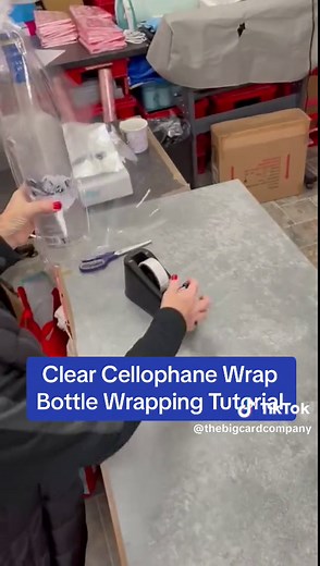 Cellophane Bottle Wrapping Tutorial 🍾 Cellophane Wrap Is Perfect For All Your Gift Wrapping Needs 🥰 Cellophane Is A Great Gift Wrapping Idea The Ultimate Gift Wrapping Hack ✨ #cellophane #cellowrap #wrappingcellophane #giftwrappinghacks #giftwrappinghacks #giftwrappingideas #bottlewrapping