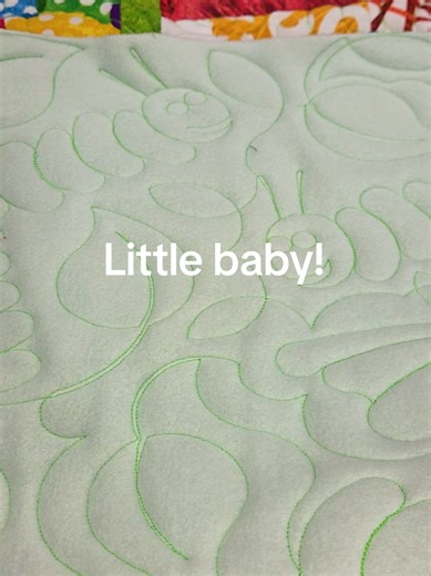 Just a little baby! The backing is fleece, that was the first time ai had quilted fleece. Turned out pretty good, very lofty! #quiltersoftiktok #fabric #babyquilt #quilting #longarmquilting
