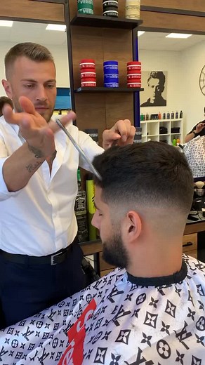Expert Hair Cutting Techniques in a Barbershop Setting