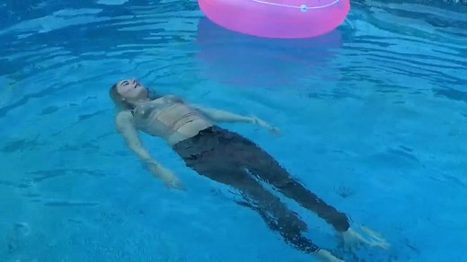 Women swim in clothes and jeans with inflatable ring #wetlook