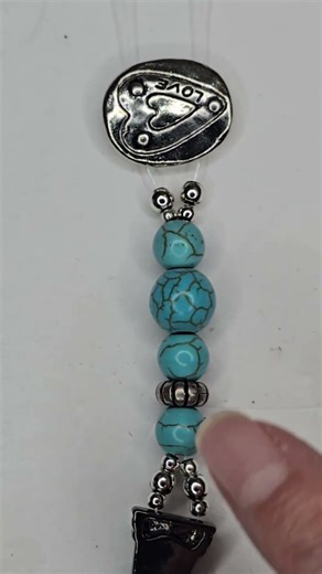 Beading tip when making multistrand beaded designs using 2 hole slider beads as your focal beads.