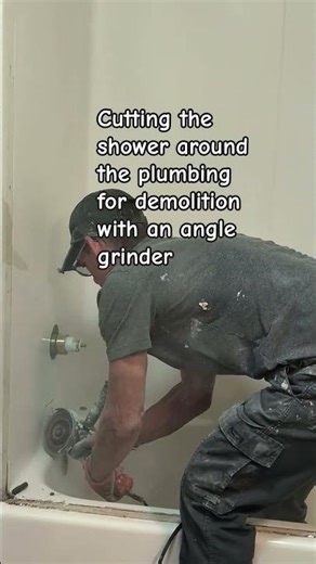 Cutting the shower around the plumbing for demolition with an angle grinder #highlights#renovation