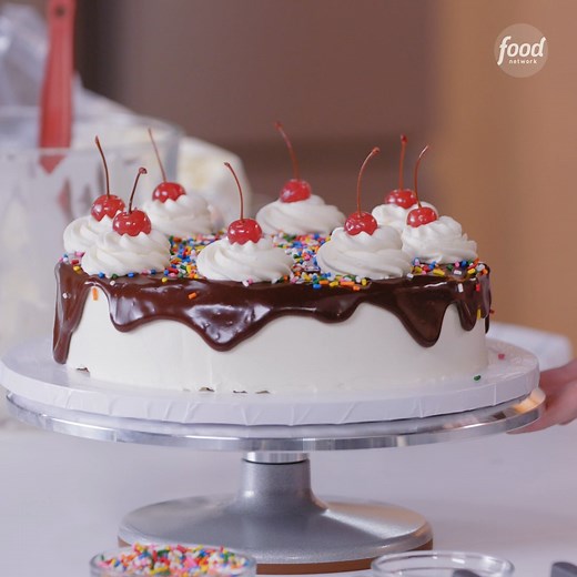 Ice cream sundae but in CAKE form 🎉 Jesse Szewczyk turns everything you love about a sundae into a fudgy, crispy ice cream cake complete with sprinkles and a cherry on top 🍒 Get the recipe: https://foodtv.com/3B8GVl1 | Food Network