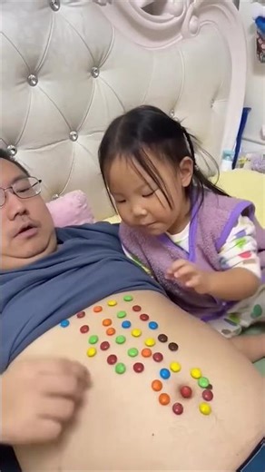 Eating peanuts,cute little baby, father taking care of baby, father and child relationship #shorts