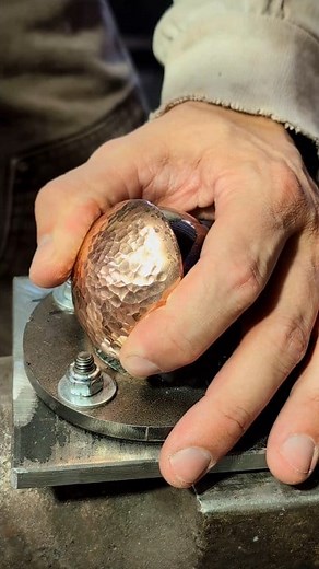 Where are my coffee lovers?! Let's make a copper coffee scoop today! A copper round is pressed into a scoop swage and hammer textured, then flame colored before being riveted to a hand forged handle ☕ #handmade #coffeetime #java #copper #custom #blacksmith | FlatlineMetalworks