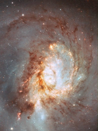 Zoom into the galaxy NGC 3256 with us 💫 This distorted galaxy is the wreckage of a head-on collision between two spiral galaxies which likely occurred 500 million years ago, and it is studded with clumps of young stars which were formed as gas and dust from the two galaxies collided. #Space #SpaceTok #JWST #astronomy #Universe #ZoomIn