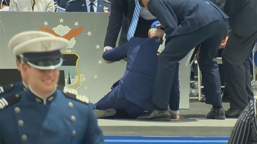 Biden trips and falls during military graduation ceremony