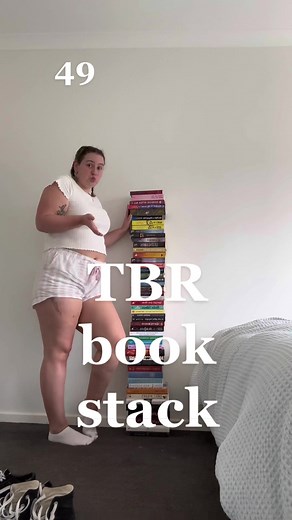 I was supposed to be re organising, instead I’m making a bookstack almost as tall as me. #tbr #booktok #bookworm #bookbuyingban