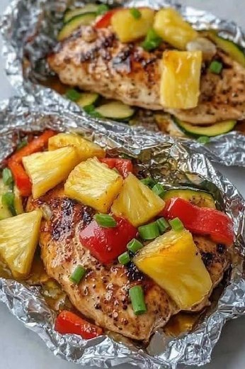 Teriyaki Chicken and Pineapple Foil Packets Ingredients: - 2 boneless, skinless chicken breasts - 1 cup fresh pineapple chunks - 1/4 cup teriyaki sauce - 1 tablespoon olive oil Must express something to keep getting my recipes....Thank you. Full recipe in comments | Air Fryer Healthy Recipes