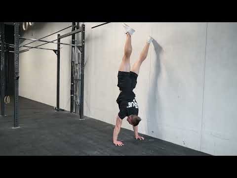 Lateral Toe Tap Handstand Hold