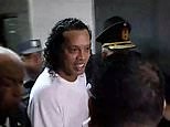 Ronaldinho departs police station after being arrested in Paraguay