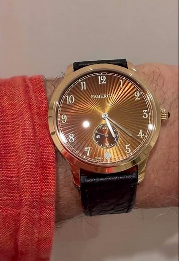 Fabergé Agathon small seconds flinqué. 18Ct honey gold + hand engraved dial, with grand feu enamel