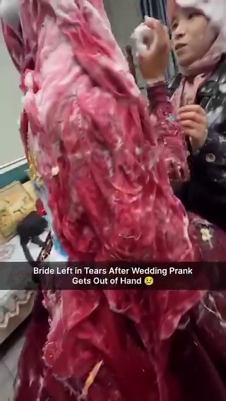 A bride in China was overwhelmed on her wedding day after being covered in foam and streamers during a prank, leaving her distressed and sparking debate online about such traditions.