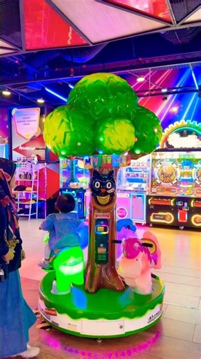 A fun travel day riding the adorable cow carousel with a squirrel in the tree! 🐄🎠🐿️🌳✨ #cute