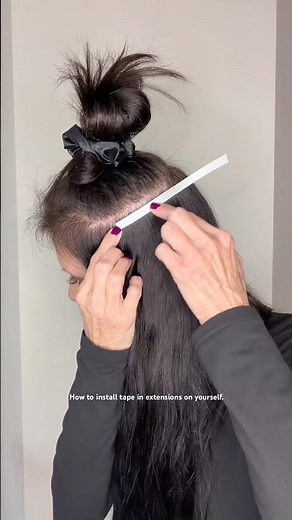 Install tape in extensions at home. #tapeinextensions #hairextensions #tapeins #diyhair