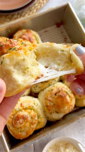 Kelsey | Food Blogger on Instagram: "Cheesy Garlic Rolls are always a big hit! Make them as a side or an appetizer and watch them disappear in seconds 🧄🧀 Comment "recipe" and I will send it to your inbox! https://dancearoundthekitchen.com/cheesy-garlic-rolls/"