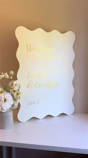 A wavy welcome sign for Georgia and Lewis ✨ Hand painted in Gold ink ✍🏻 #weddingsigns #welcomesign #weddingwelcomesign #2026bride