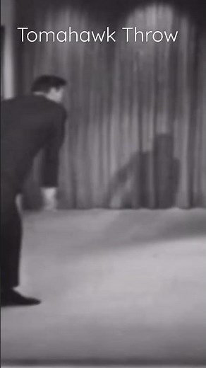 Ed Ames teaches Johnny Carson how to throw a Tomahawk.