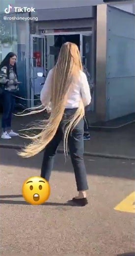 Very beautiful woman with very beautiful ankle length light blonde hair