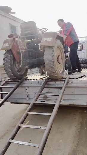How to Load a Tractor onto a Flatbed Trailer Safely