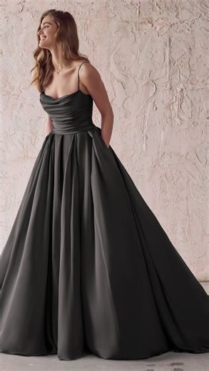 Blue Sage Bridal on Instagram: "Our next Movie Bride Dress Feature is Lydia from Beetlejuice! We LOOOOOVE this red gown and how appropriate to add a stunning black and lace veil to complete this spooky look! Model: @sophiergordon Dress: @maggiesotterodesigns Scarlet Bouquets: @burratababee @katemel03"