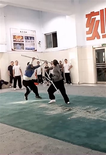 47 reactions | Shaolin staff vs staff dui lian ( 双人对棍 ) with our...